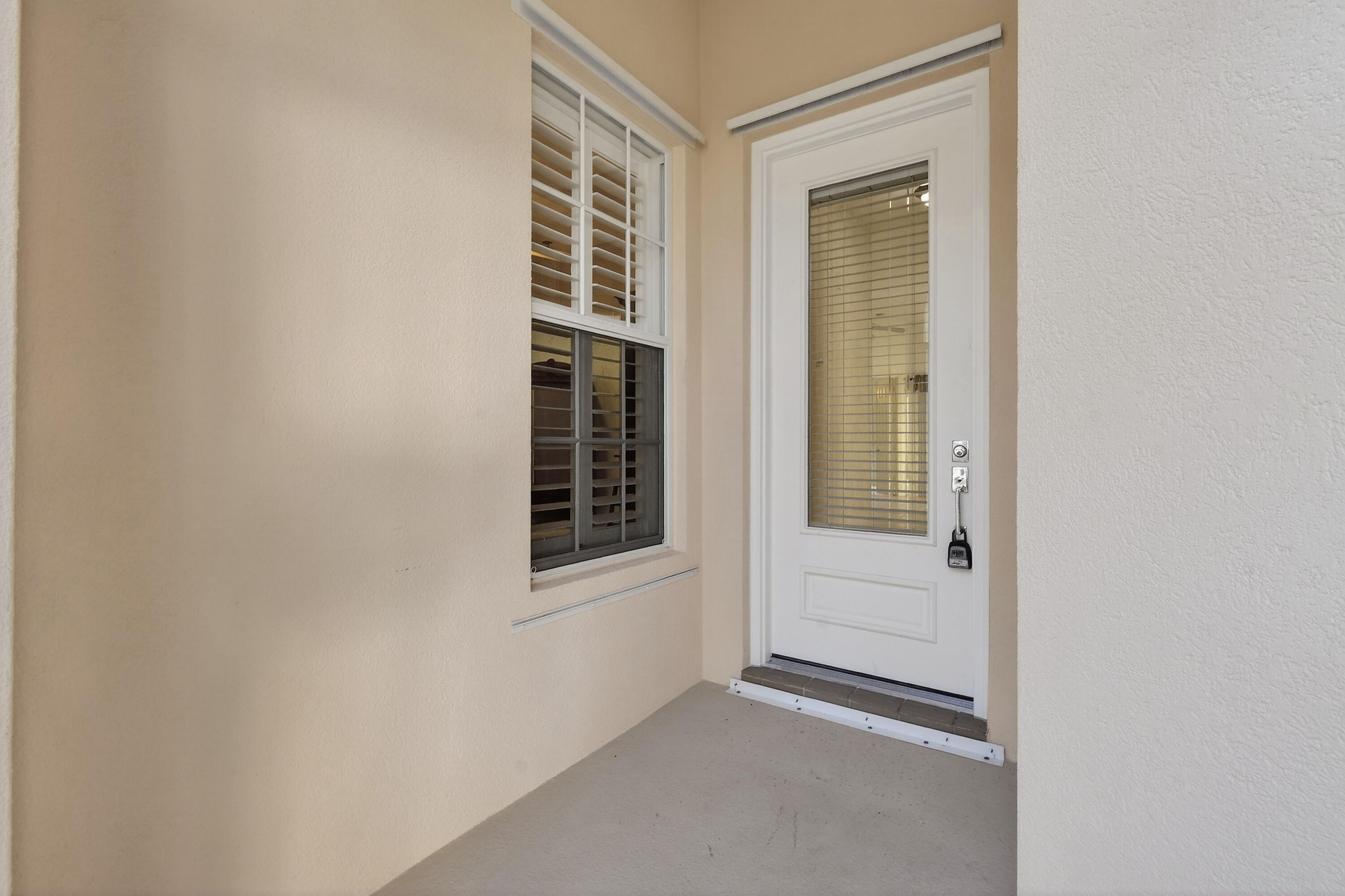 8892 Southeast Eldorado Way Hobe Sound, FL 33455 - Photo 6 of 83 SCREENED IN FRONT PORCH