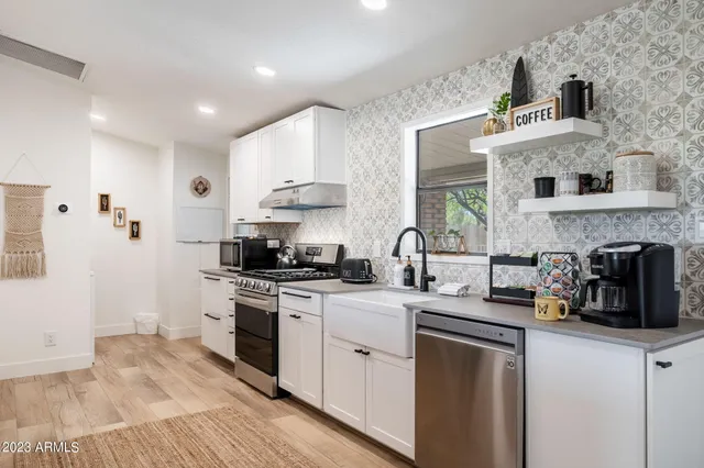 a bathroom with a toilet and a sink