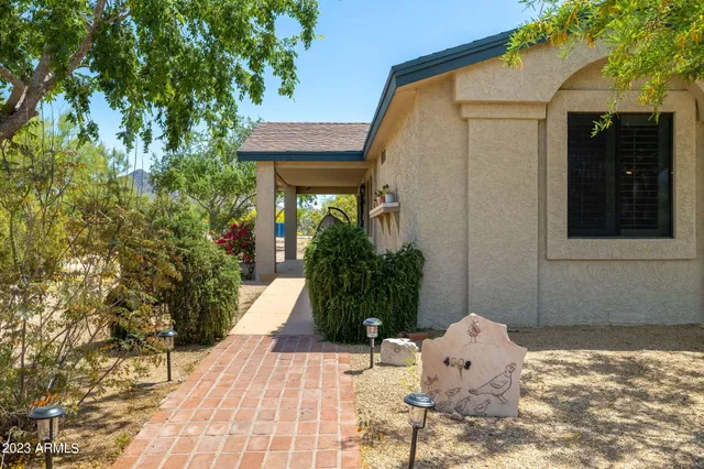 a house view with a outdoor space