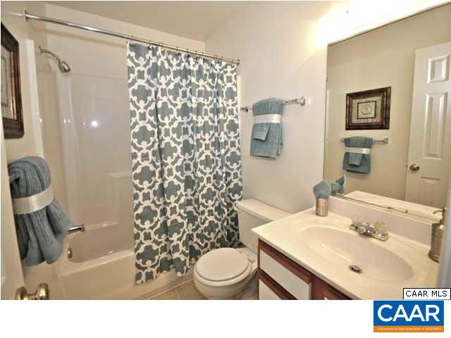 200 Lake Club Court, Unit 1 Charlottesville, VA 22902 - Photo 14 of 17 a bathroom with a sink toilet and shower