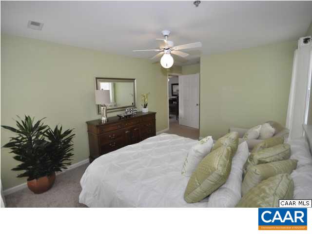 200 Lake Club Court, Unit 1 Charlottesville, VA 22902 - Photo 16 of 17 a living room with furniture and potted plant