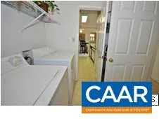 a view of a chairs and table in the terrace