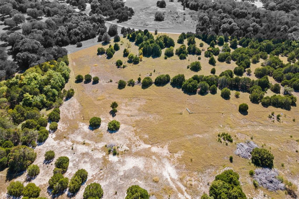 1198 South Clark Road Cedar Hill, TX 75104 - Photo 6 of 33 a view of a backyard of the house