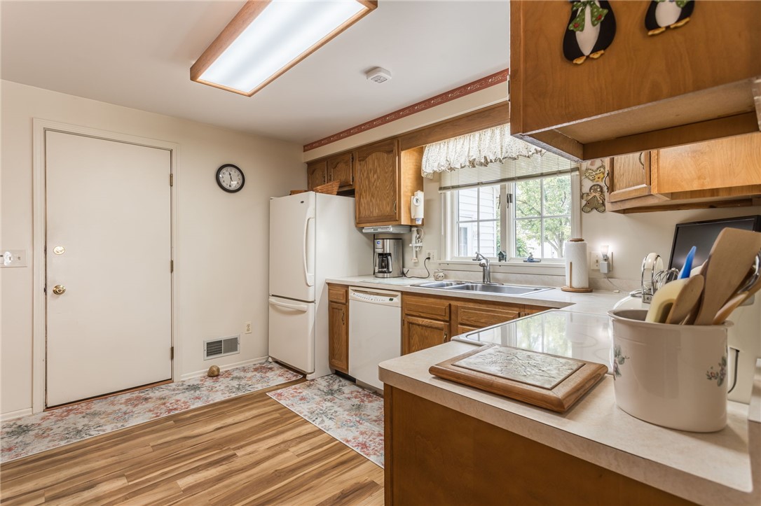 23 Chiswick Drive Riga, NY 14428 - Photo 13 of 44 Laminate Flooring, microwave does not convey all o