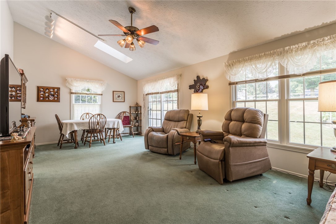 23 Chiswick Drive Riga, NY 14428 - Photo 9 of 44 Large dining room/family room combo complete with
