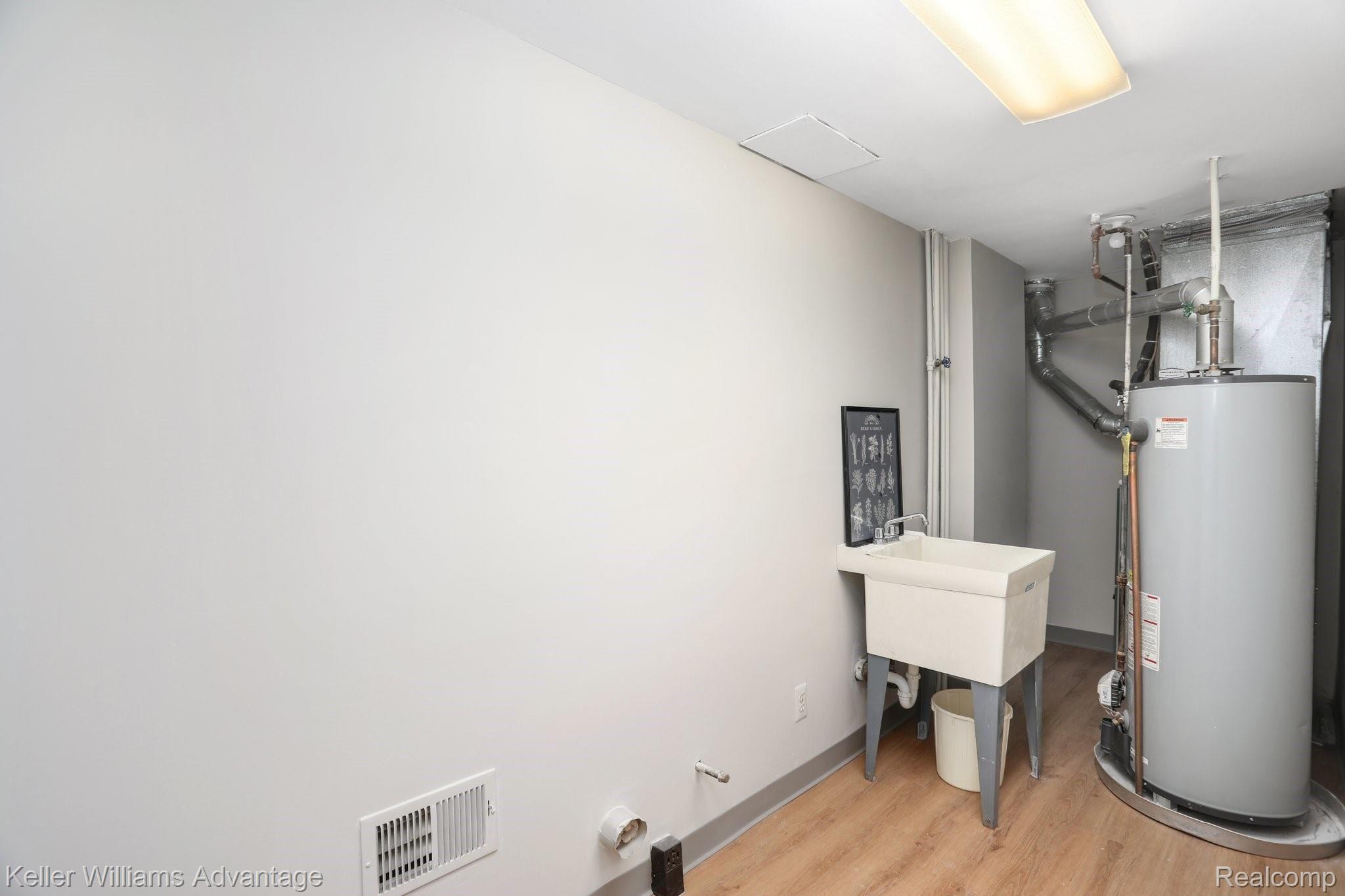875 GreenView Court, Unit 58 Rochester, MI 48307 - Photo 16 of 27 Unit is plumbed for washer and dryer (includes hook-up for both gas and electric dryer) and includes a laundry basin already