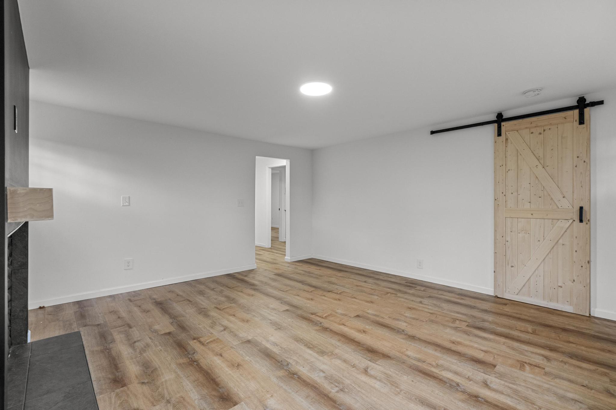 5 Pine Trail Avon, CT 06001 - Photo 8 of 26 wooden floor in an empty room