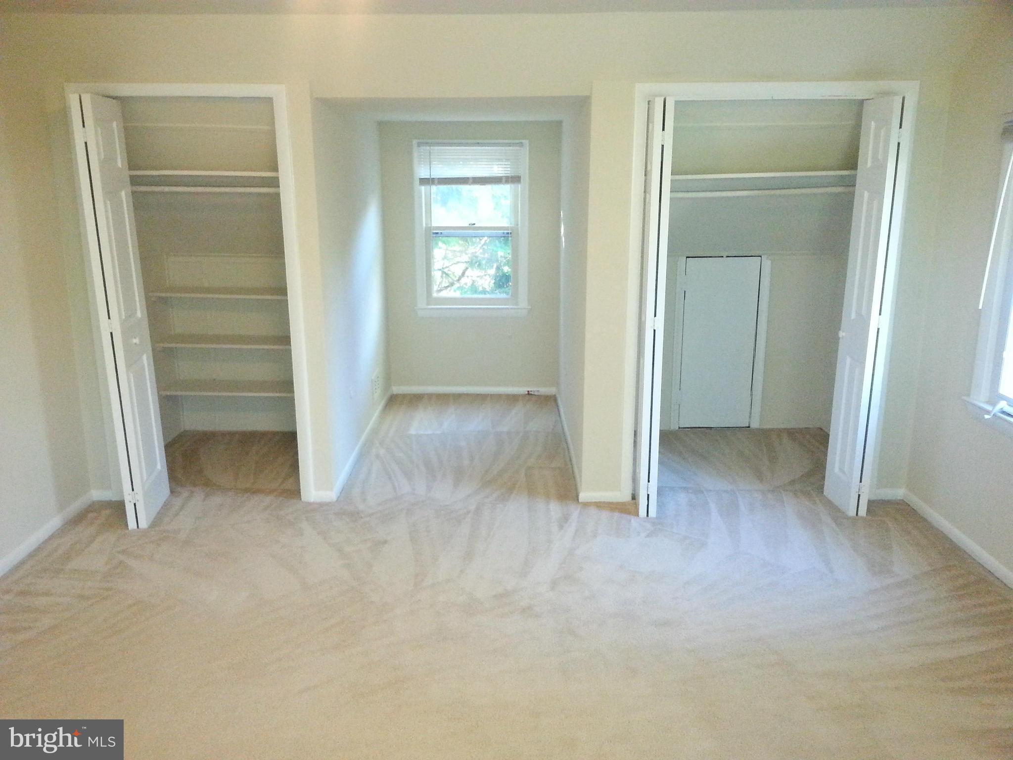 10001 Brunett Avenue Silver Spring, MD 20901 - Photo 18 of 23 an empty room with windows and closet