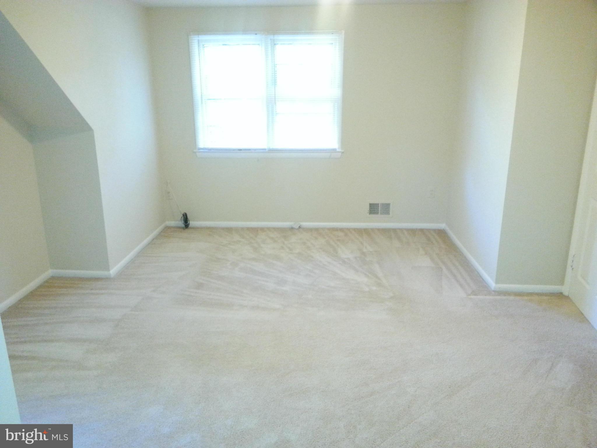 10001 Brunett Avenue Silver Spring, MD 20901 - Photo 19 of 23 an empty room with a window