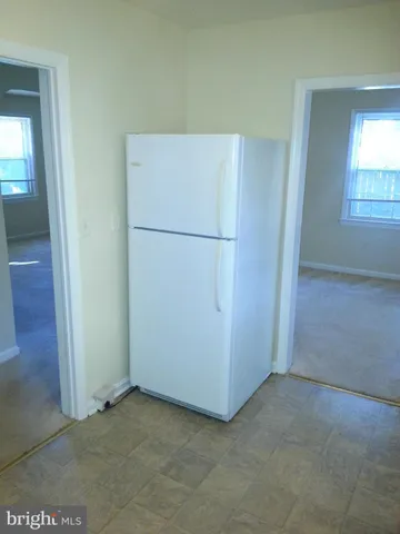 a utility room with washer and dryer