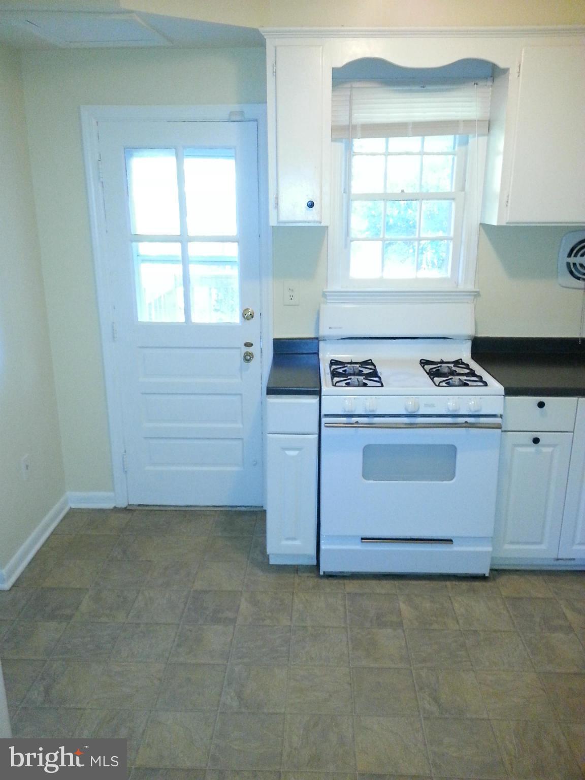 10001 Brunett Avenue Silver Spring, MD 20901 - Photo 9 of 23 a utility room with washer and dryer