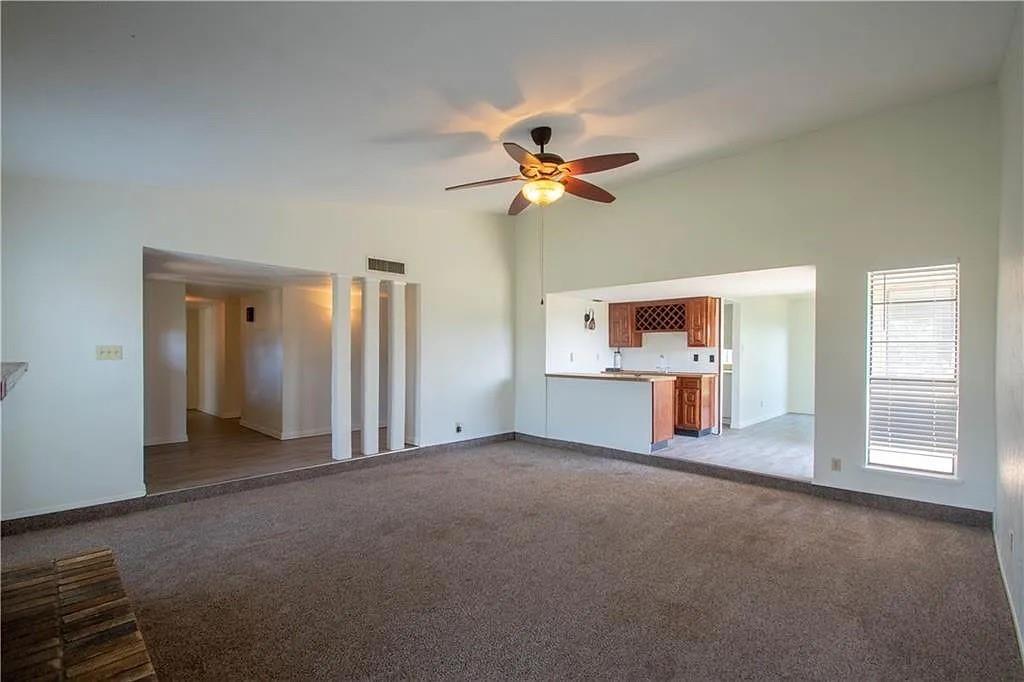 6500 Blue Ridge Trail Plano, TX 75023 - Photo 10 of 14 Open concept living area featuring a vaulted ceiling and ceiling fan