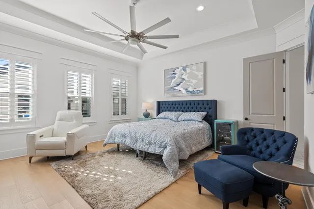 a bedroom with bed and window