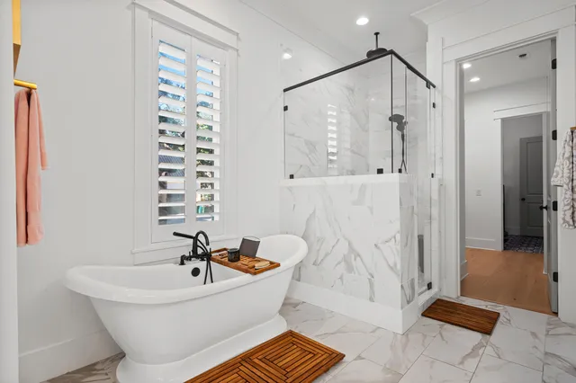 a view of a hallway with seating area