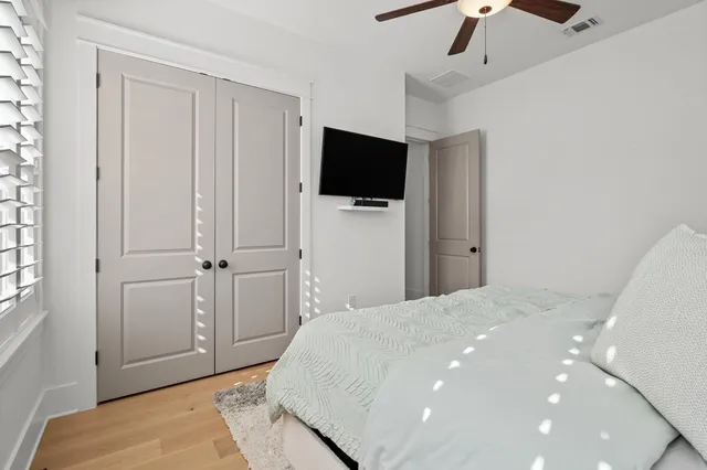 a view of a house with swimming pool and a yard