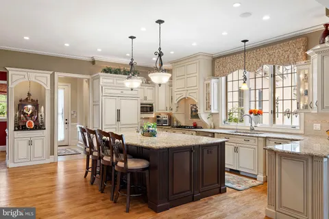a living room with furniture rug and window