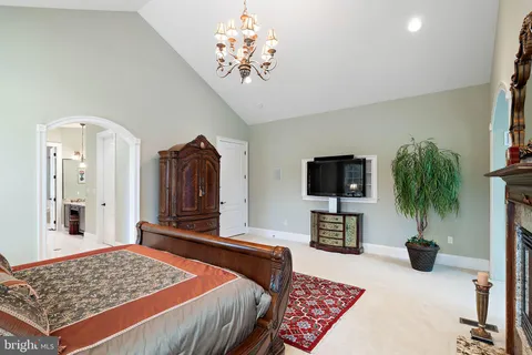 a bed room with a bed and a window