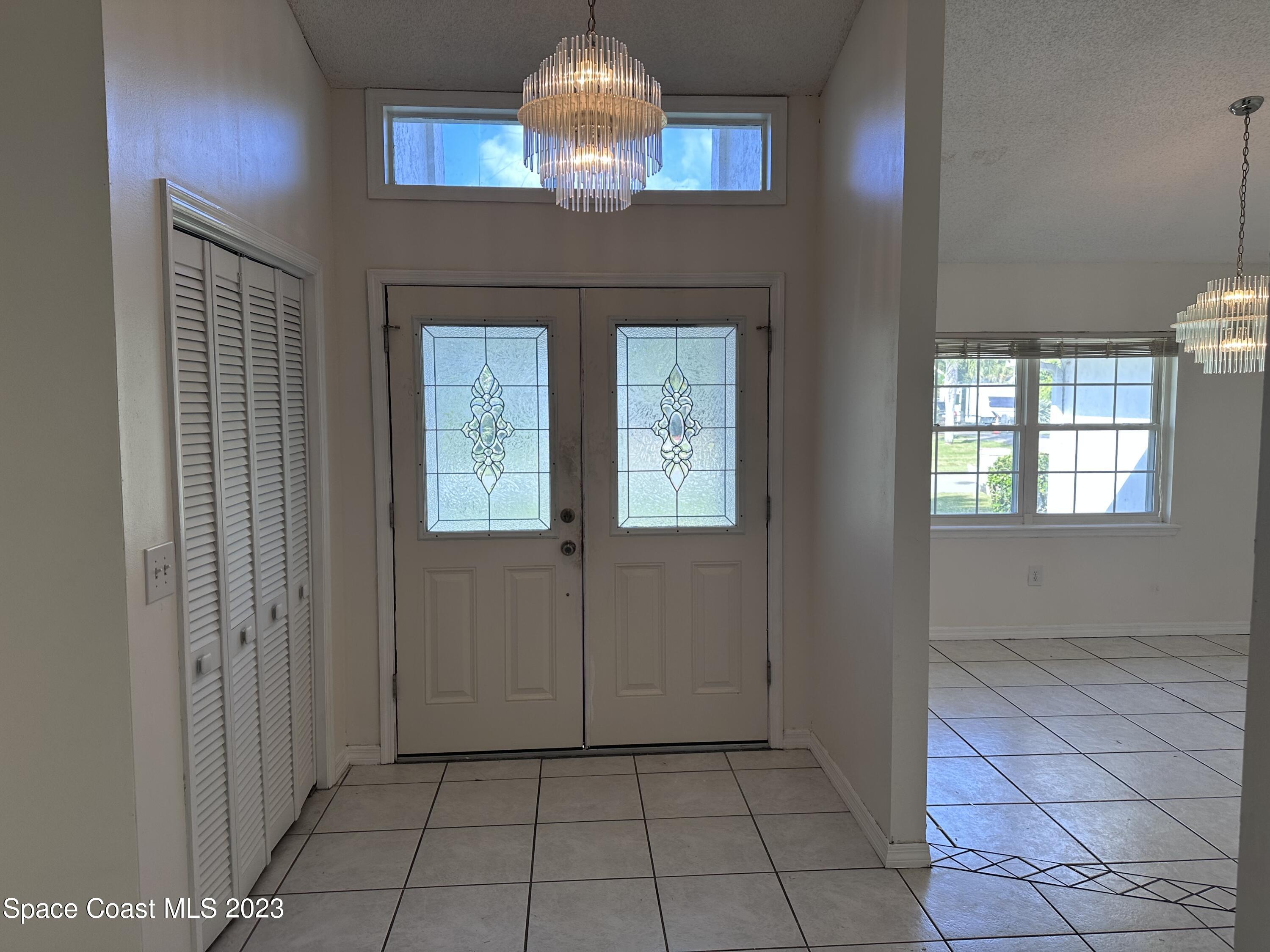 1369 Elcon Drive Melbourne, FL 32904 - Photo 7 of 13 a view of an entryway door