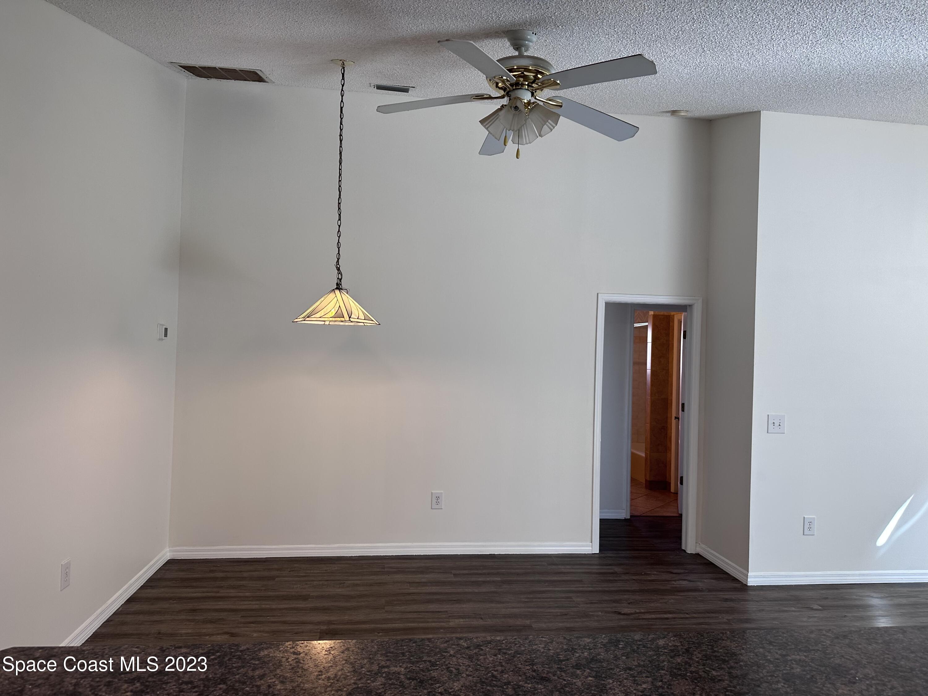 1369 Elcon Drive Melbourne, FL 32904 - Photo 9 of 13 a view of an empty room