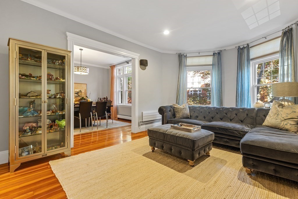 20 Strathmore Road, Unit 2 Brookline, MA 02445 - Photo 5 of 28 a living room with furniture and a fireplace