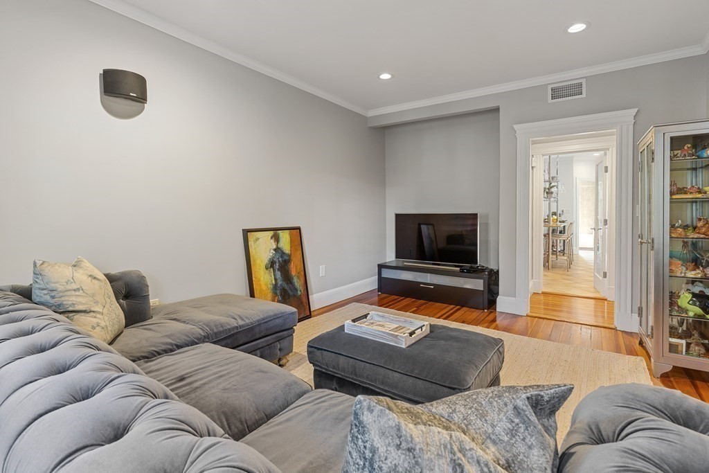 20 Strathmore Road, Unit 2 Brookline, MA 02445 - Photo 7 of 28 a living room with furniture and a flat screen tv