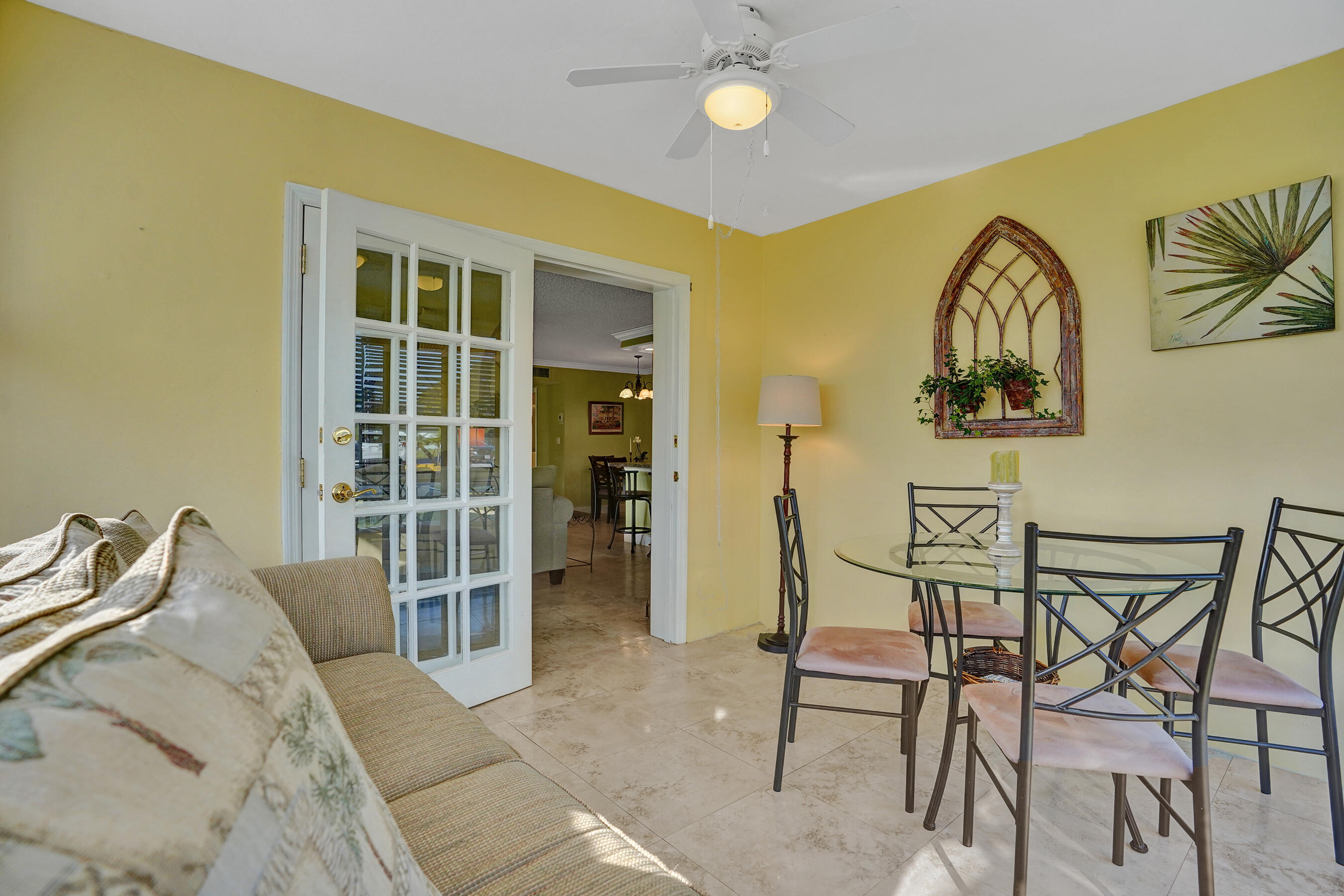 515 High Point Drive, Unit A Delray Beach, FL 33445 - Photo 18 of 60 a view of a livingroom with furniture and window