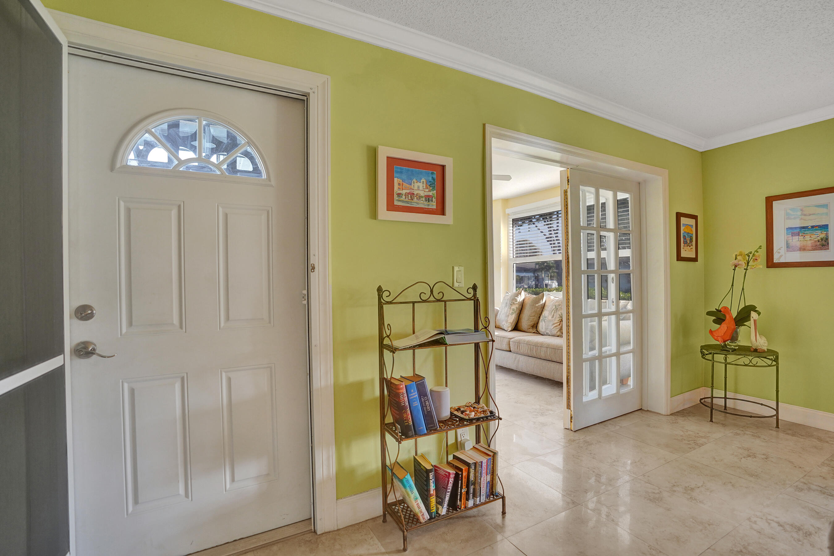 515 High Point Drive, Unit A Delray Beach, FL 33445 - Photo 4 of 60 a view of a livingroom with furniture and windows