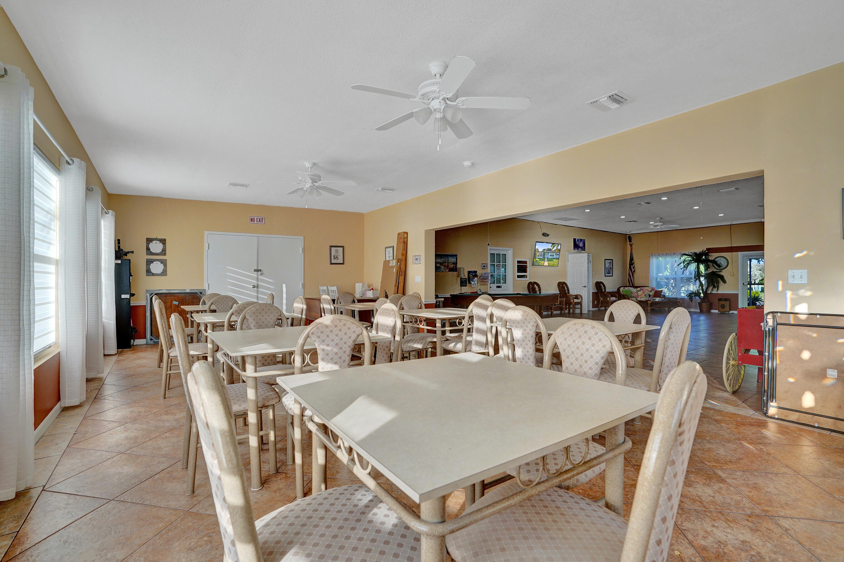 515 High Point Drive, Unit A Delray Beach, FL 33445 - Photo 56 of 60 a view of a dining area with furniture