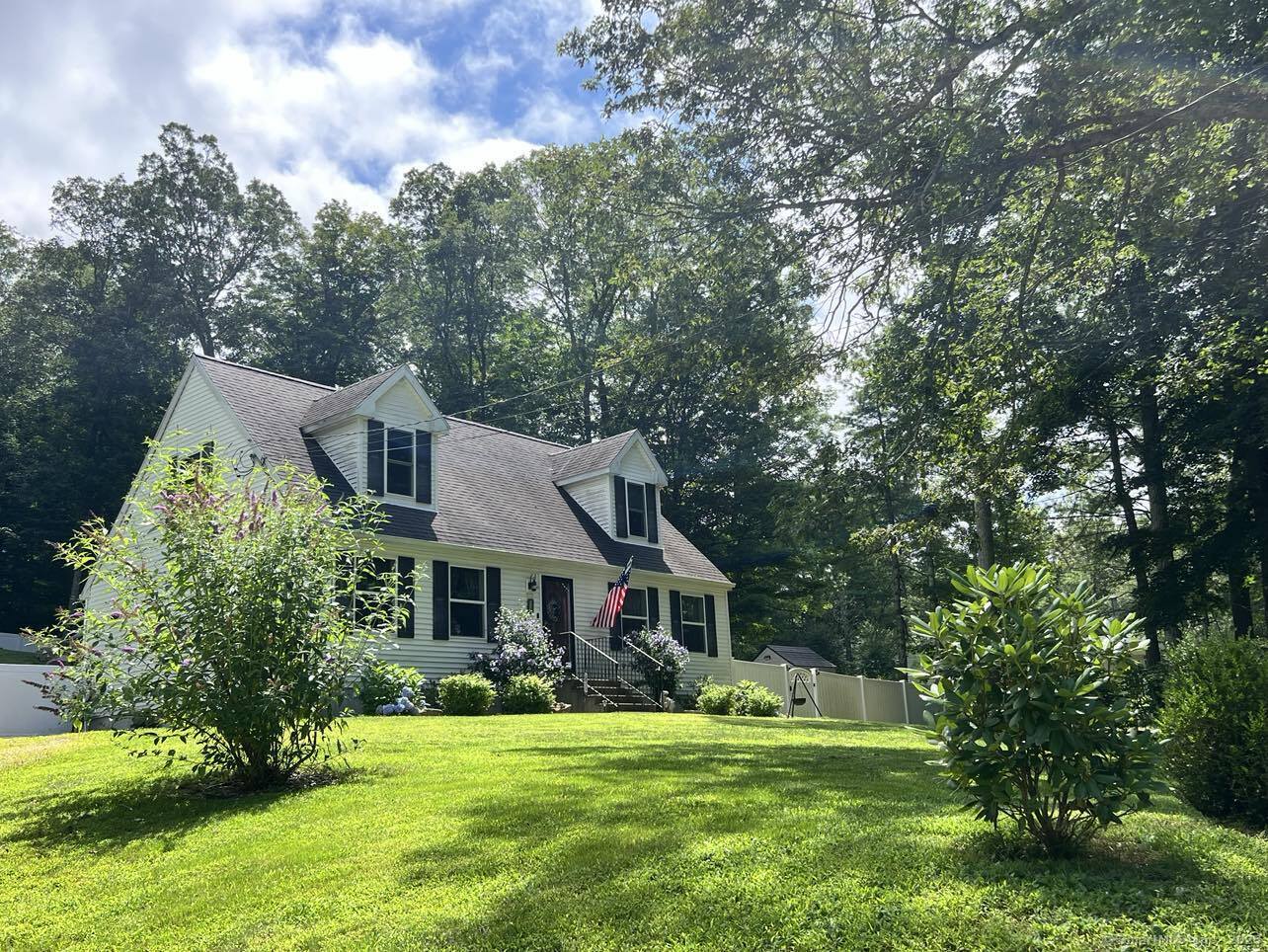 114 Breakneck Hill Road Killingly, CT 06241 - Photo 1 of 1 a front view of a house with a yard porch and sitting area