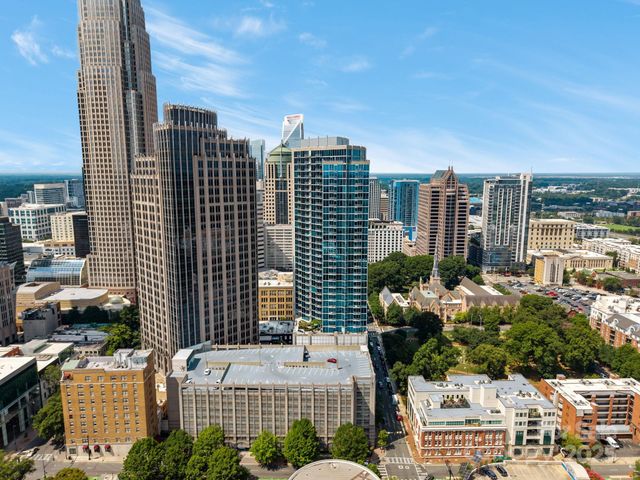 a view of city with tall buildings