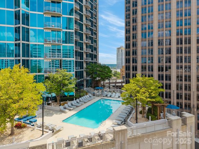 a view of balcony with furniture