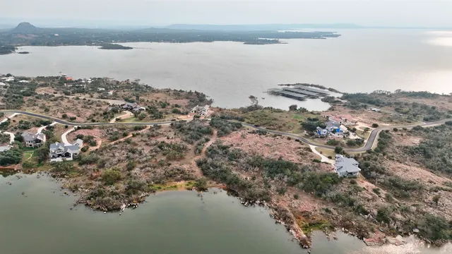 a view of a lake with mountain in the background