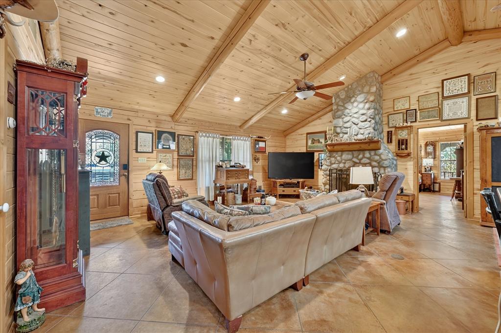 1623 3 Skillet Road Springtown, TX 76082 - Photo 4 of 40 Vaulted wood-paneled ceilings with exposed beams, recessed lighting, and a ceiling fan