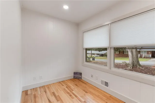 an empty room with windows