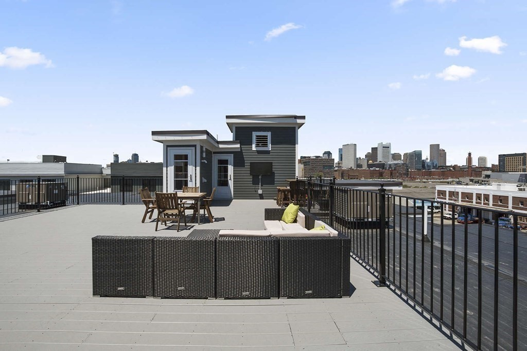 345 D Street, Unit 11 Boston, MA 02127 - Photo 22 of 23 a view of a terrace with furniture
