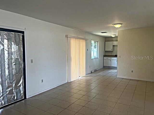 12 Pine Course Way Ocala, FL 34472 - Photo 5 of 29 a view of a kitchen with a sink and dishwasher cabinets
