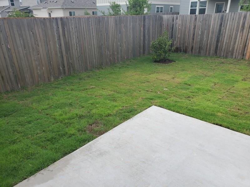 6404 Gunflint Drive Austin, TX 78747 - Photo 19 of 21 A fenced backyard offers a private outdoor space for relaxation and enjoyment.