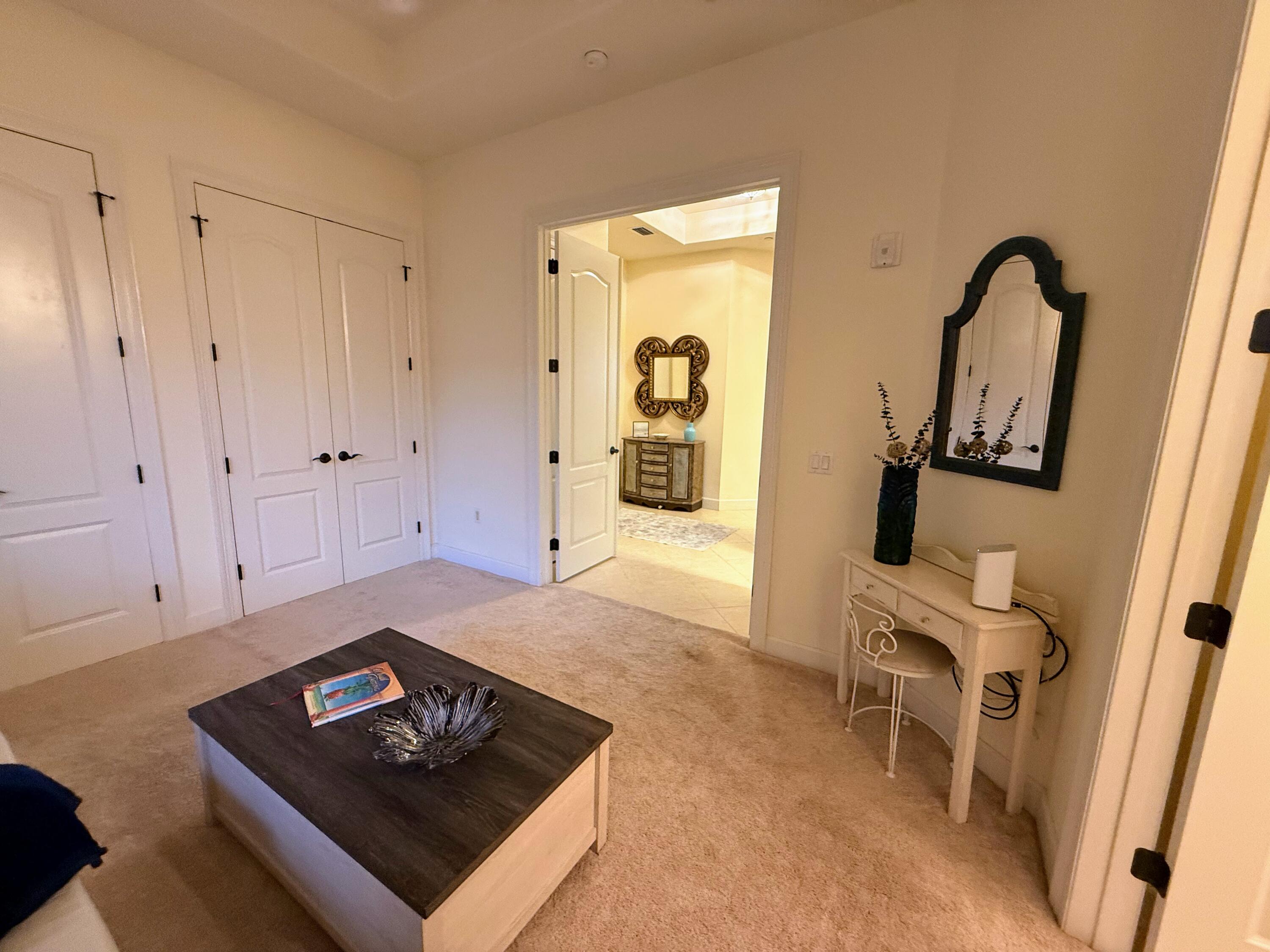 20 Orange Avenue, Unit 9 Fort Pierce, FL 34950 - Photo 46 of 92 a living room with furniture and a gate