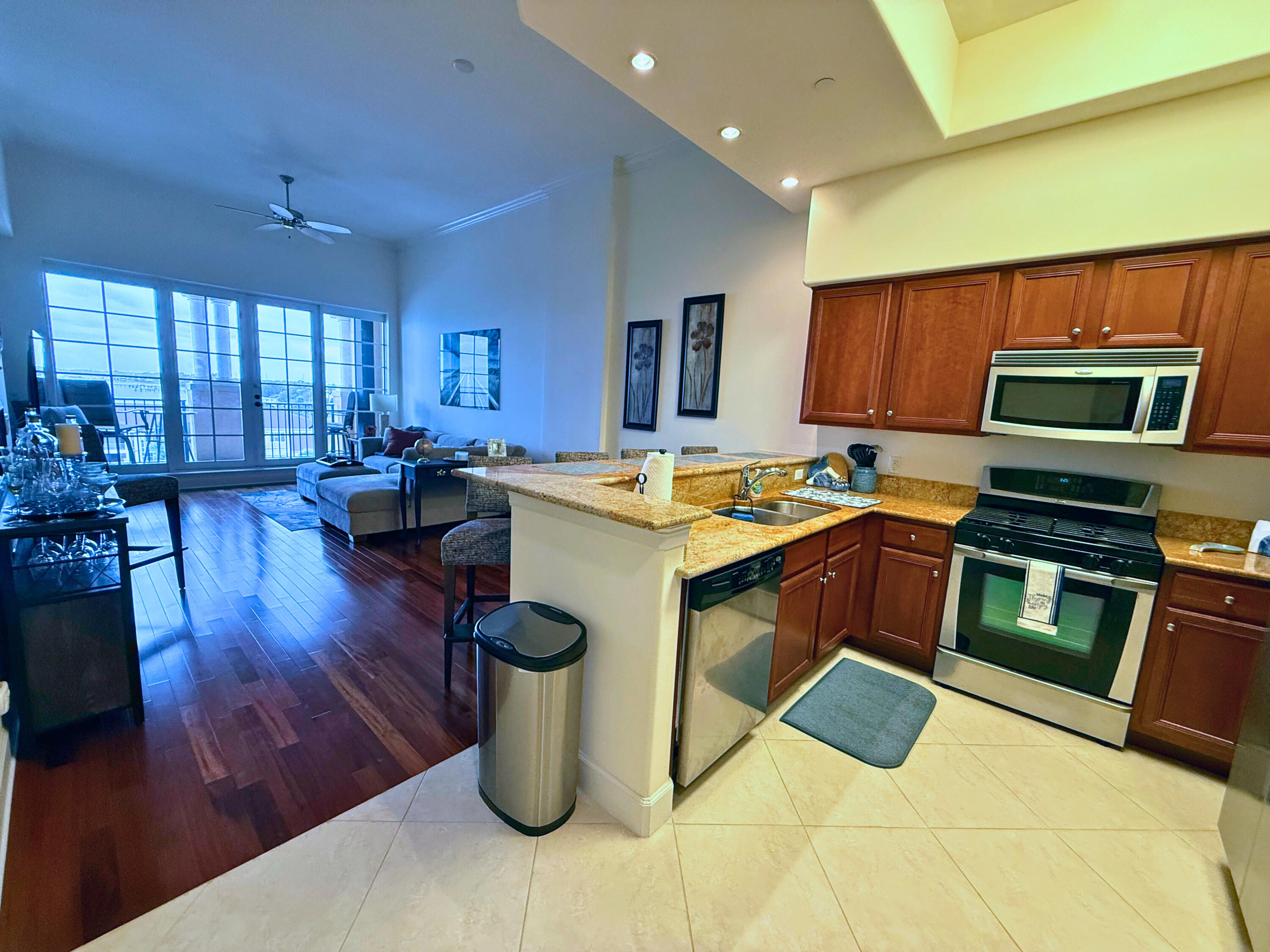 20 Orange Avenue, Unit 9 Fort Pierce, FL 34950 - Photo 54 of 92 a kitchen with a sink appliances and cabinets