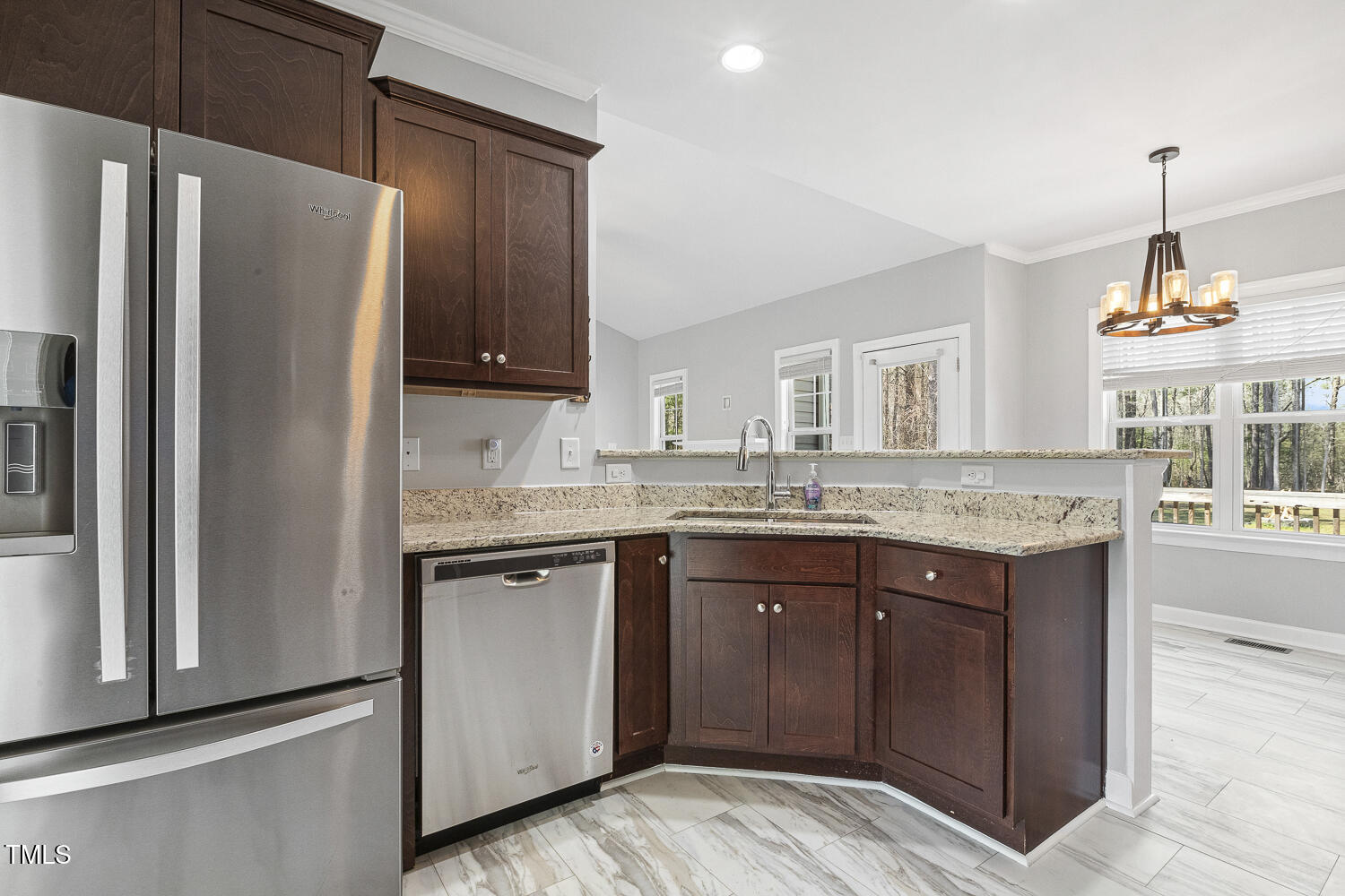 808 Cross Link Drive Angier, NC 27501 - Photo 12 of 30 a kitchen with a sink and a refrigerator
