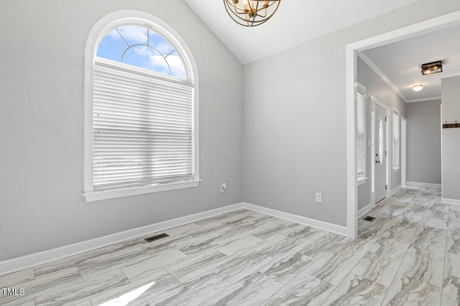 808 Cross Link Drive Angier, NC 27501 - Photo 15 of 30 a view of empty room with window and wooden floor