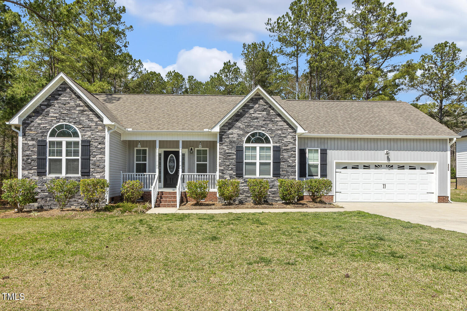 808 Cross Link Drive Angier, NC 27501 - Photo 2 of 30 a front view of a house with garden