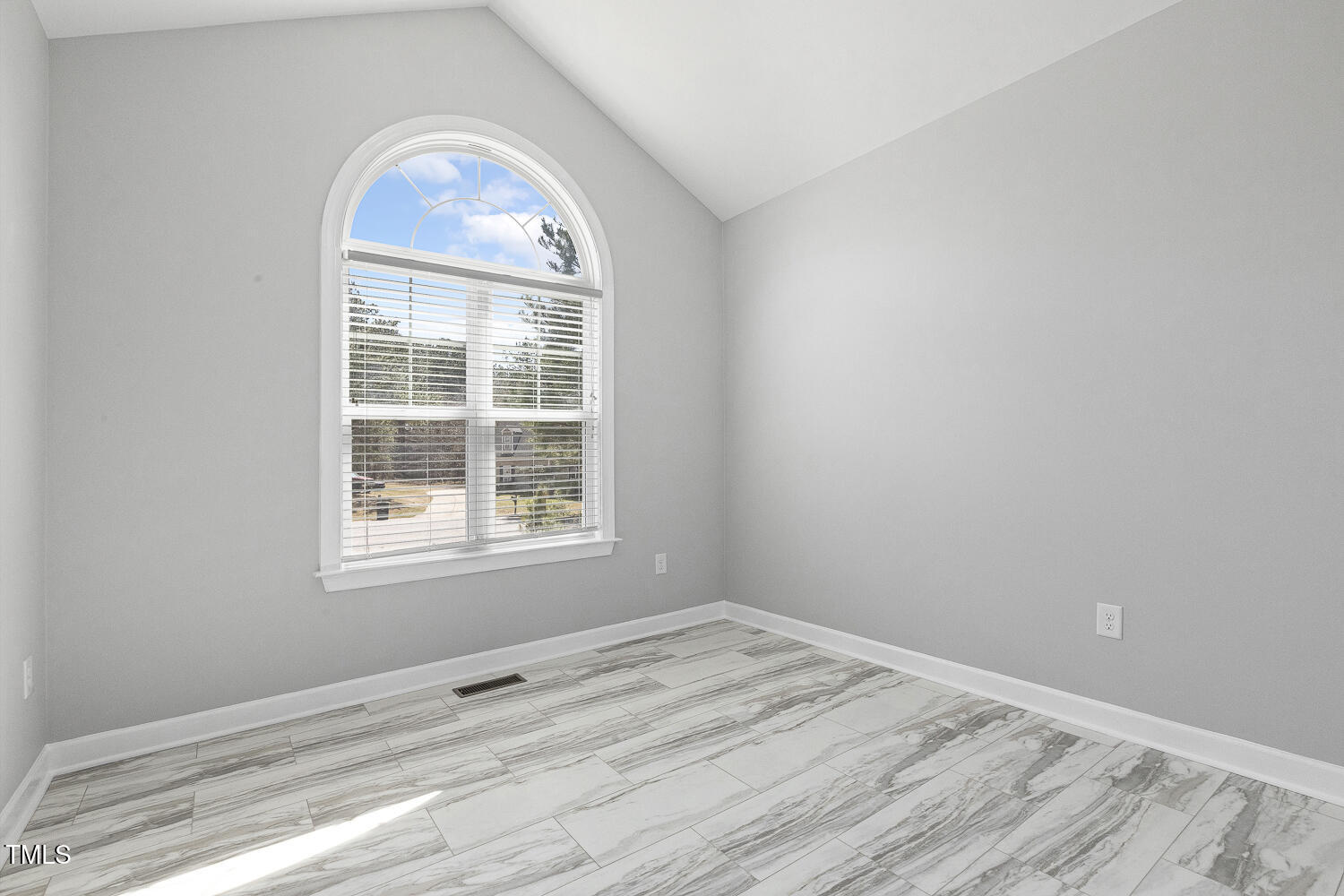 808 Cross Link Drive Angier, NC 27501 - Photo 22 of 30 an empty room with wooden floor and windows