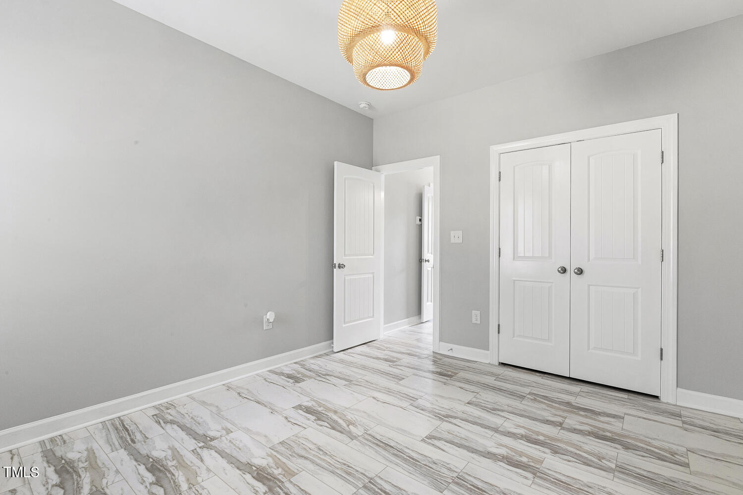 808 Cross Link Drive Angier, NC 27501 - Photo 26 of 30 a view of a room with wooden floor and white walls