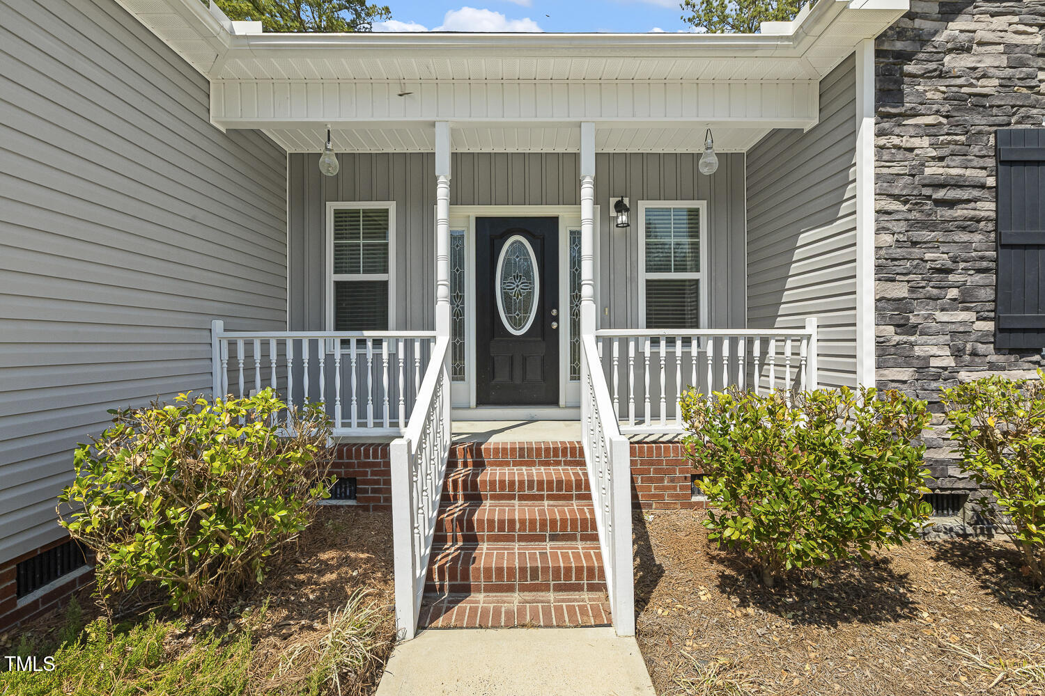 808 Cross Link Drive Angier, NC 27501 - Photo 3 of 30 a front view of a house with garden