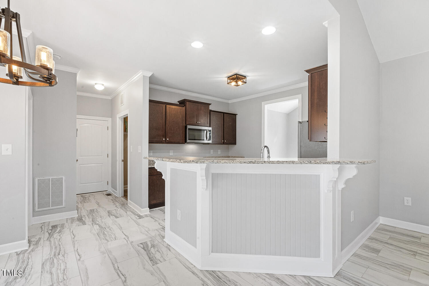 808 Cross Link Drive Angier, NC 27501 - Photo 9 of 30 a view of kitchen with stainless steel appliances kitchen island sink and refrigerator