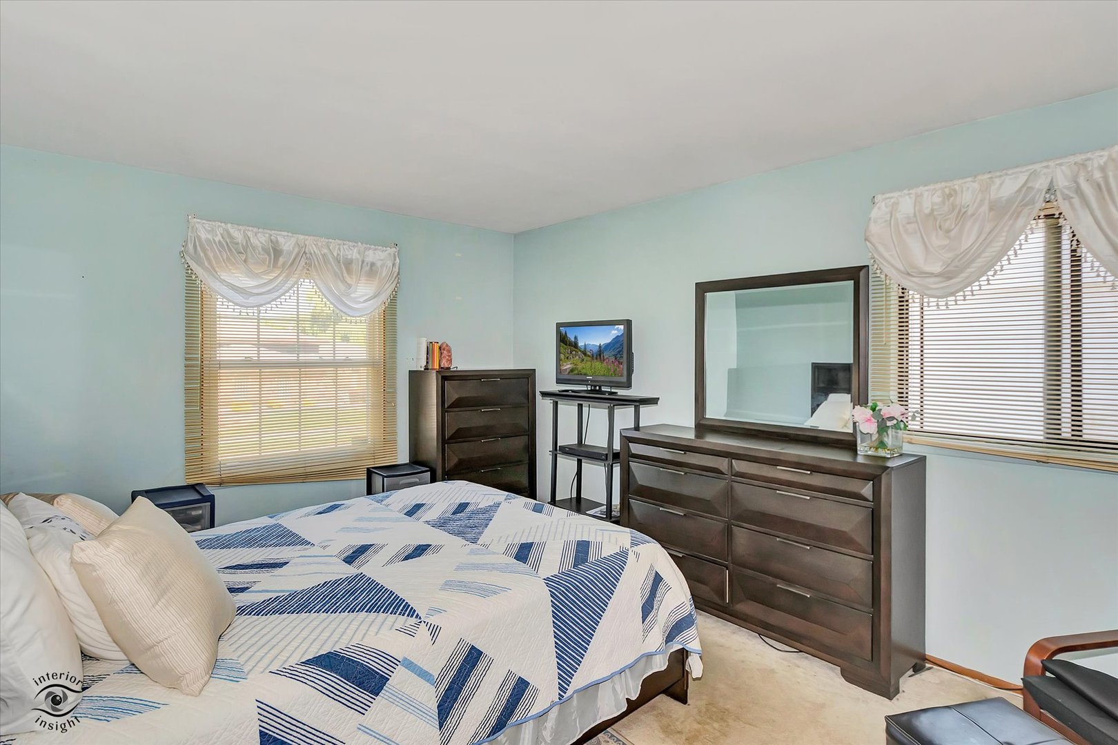 3257 Magnolia Drive Markham, IL 60428 - Photo 12 of 26 a bed sitting in a bedroom next to a window with pc on the table