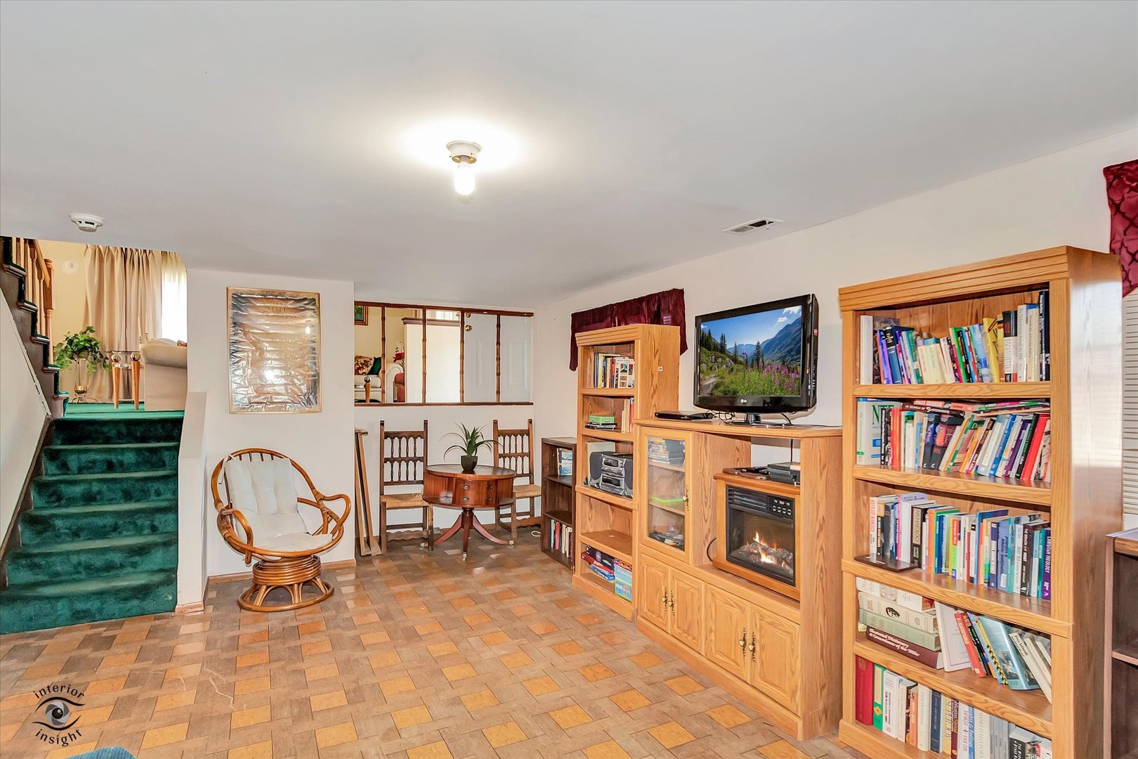 3257 Magnolia Drive Markham, IL 60428 - Photo 18 of 26 a living room with furniture a window and a book shelf