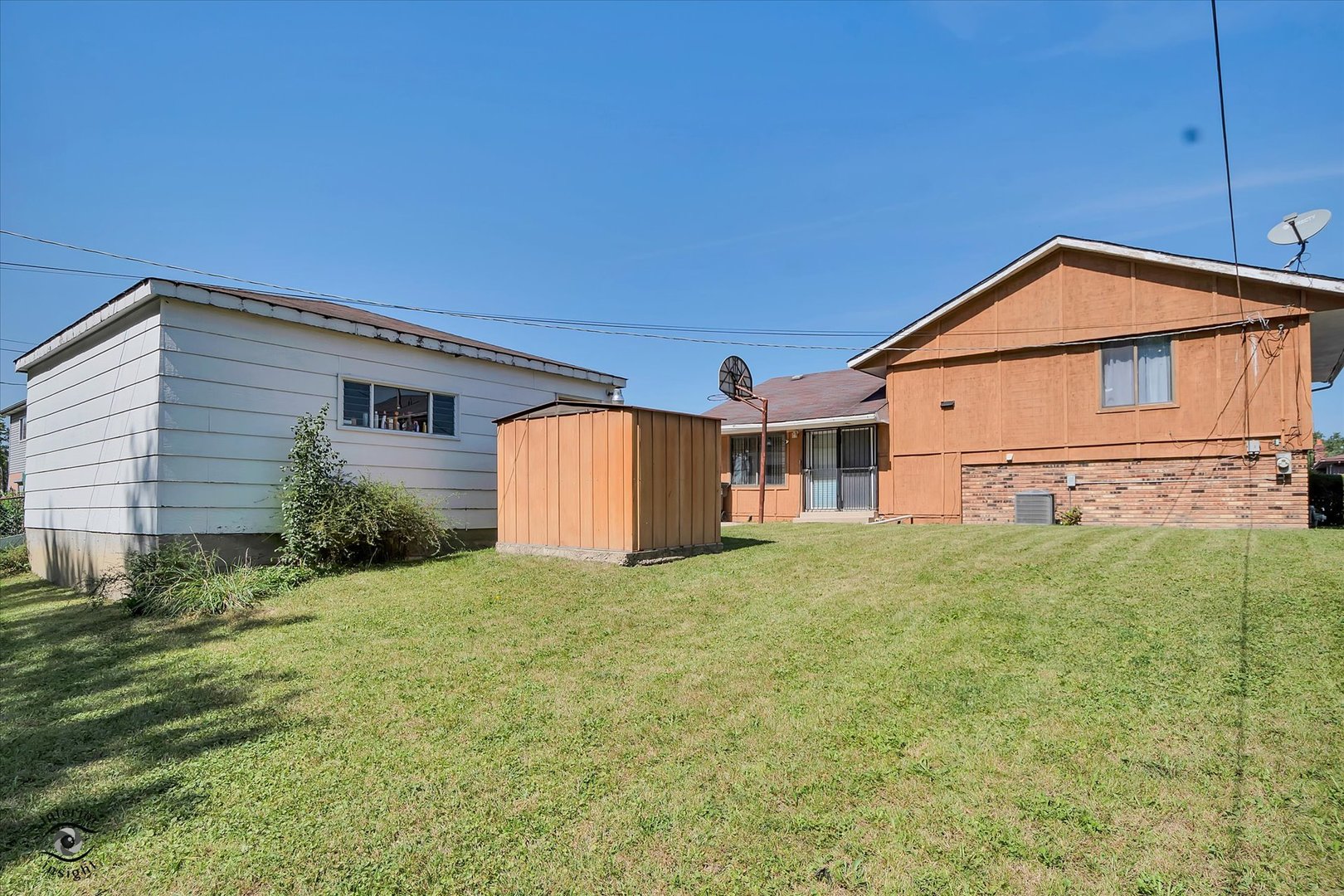 3257 Magnolia Drive Markham, IL 60428 - Photo 24 of 26 a front view of a house with a garden