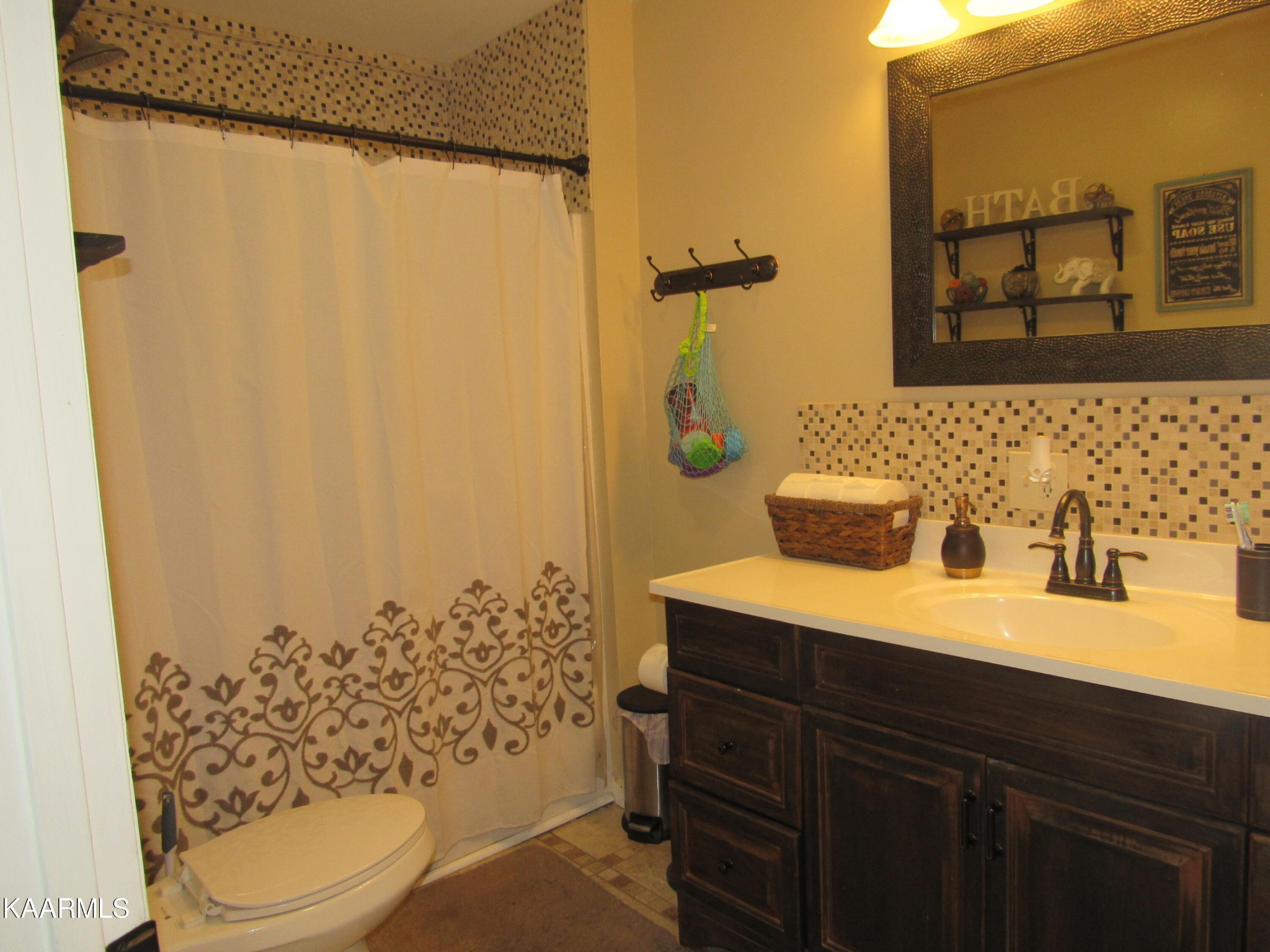 146 Outer Drive Oak Ridge, TN 37830 - Photo 18 of 38 a bathroom with a sink toilet and shower
